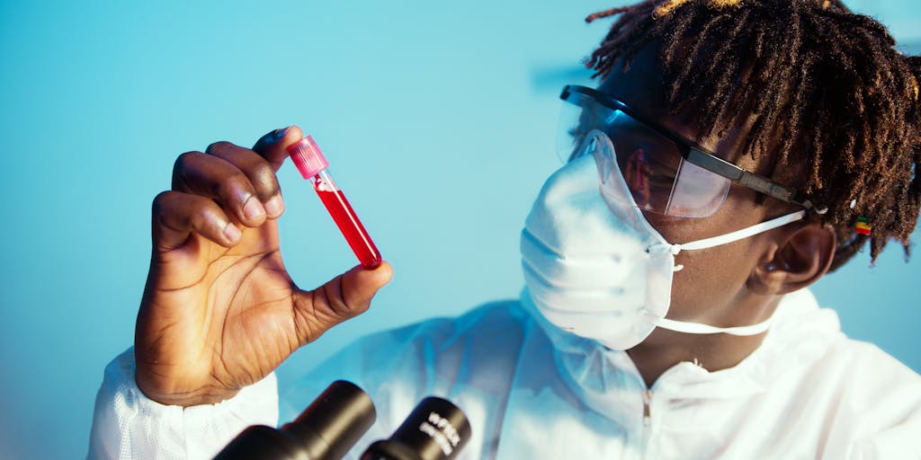 An editorial “quality-control” lab scene: an editor in a lab coat leans over a wooden table, inspecting printed articles under a large magnifying glass while another person holds a red wax stamp labeled “QUALITY APPROVED.” Test tubes and color-coded folders labeled SEO, UX, Video form a playful, professional backdrop—conveys rigorous review and standards applied to content creation.