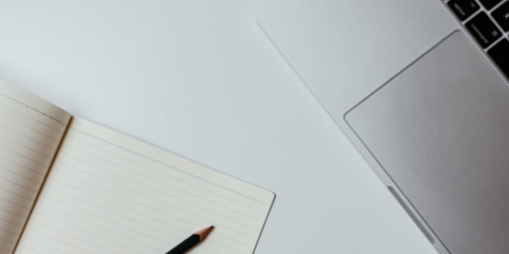 A creative, surreal still-life: an open paper notebook where pages turn into floating translucent digital cards labeled as AI summaries, annotated with small icons and color accents inspired by Google’s palette. Soft studio lighting and a shallow depth of field make the transformation from paper to digital the focal point, symbolizing conversion of information into concise overviews.