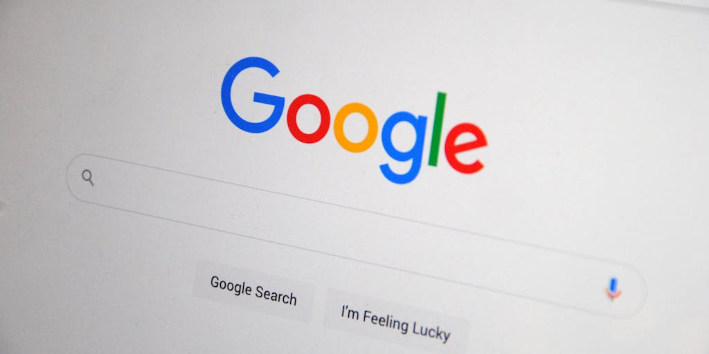 A close-up, polished UI concept image showing a browser address bar with a chain-link graphic connecting two URLs; a large hand-drawn eraser or scissors is cutting the chain and a pop-up dialog labeled 'Undo 301 Redirect?' with confirm/cancel buttons appears. Minimalist, flat-design style with crisp colors, subtle drop shadows, and focus on the interaction elements.
