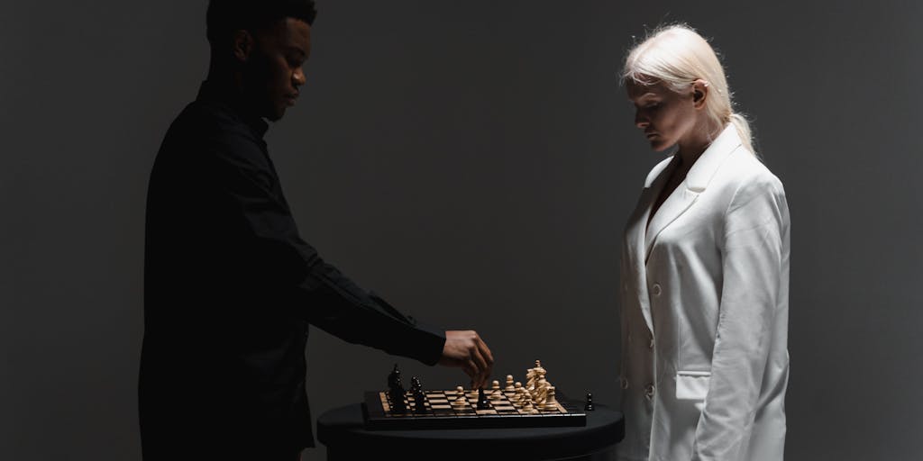 Dramatic, shallow-depth-of-field shot of a chessboard where two opposing kings are branded subtly with text labels “SEOPress” and “Rank Math.” Warm side lighting throws long shadows; scattered HTML snippets and small magnifying-glass props lie near the pieces to imply strategy and analysis. The mood is competitive and cinematic, highlighting strategic choices between the two SEO plugins.